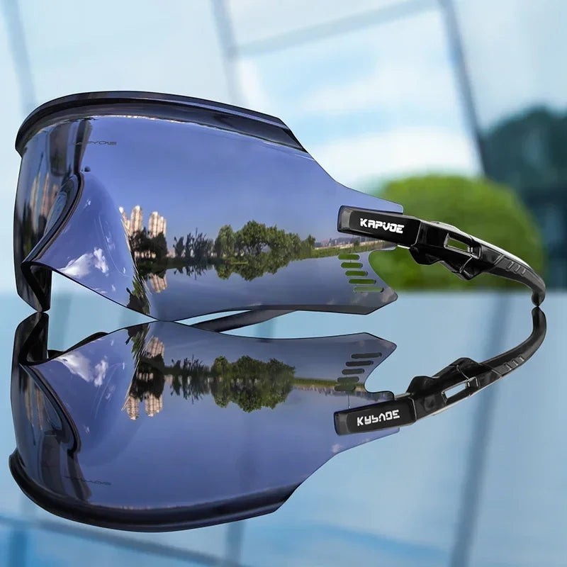 Velovoila KAPVOE UV400 cycling sunglasses with a reflective one-piece shield lens and black aerodynamic frame