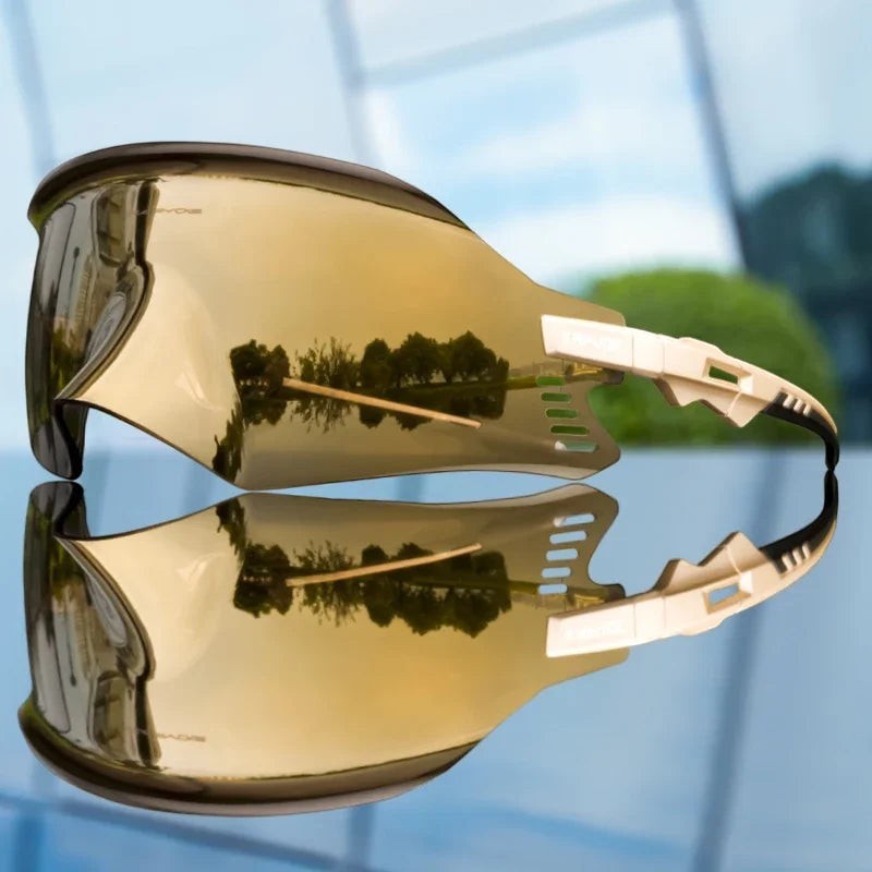 Velovoila KAPVOE UV400 cycling sunglasses with a gold mirrored shield lens and aerodynamic frame for road and MTB riding